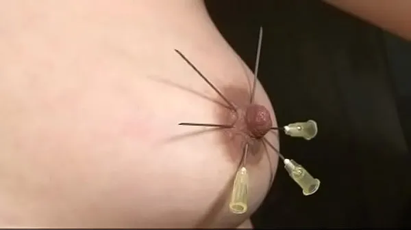 Meilleures vidéos sur l’énergie Japon BDSM piercing mamelon et choc électrique